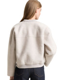 Chaqueta de mujer de manga larga con cremallera de bouclé y estampado liso
