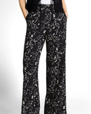 Pantalón ancho de mujer con cintura alta elástica y diseño liso