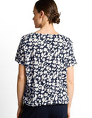 Camiseta de manga corta de mujer con cuello pico y estampado de flores