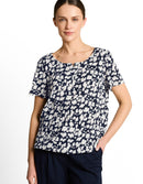 Camiseta de manga corta de mujer con cuello pico y estampado de flores