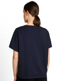 Camiseta de mujer de manga corta con cuello redondo, diseño liso y dibujo frontal