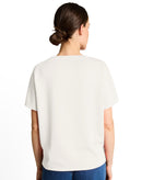 Camiseta de manga corta de mujer con cuello redondo, diseño liso y texto frontal