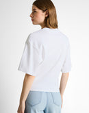 Camiseta de manga corta de mujer con cuello redondo , frunce lateral y diseño liso
