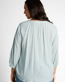 Blusa de manga larga camisera de mujer con cuello de pico y rayas finas
