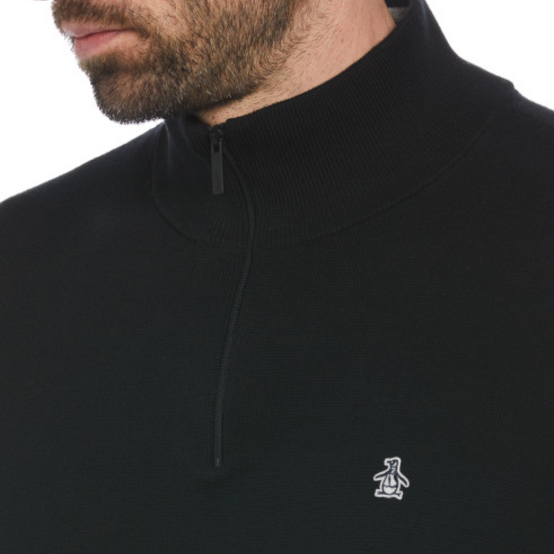 Jersey negro con detalles en el cuello y cremallera