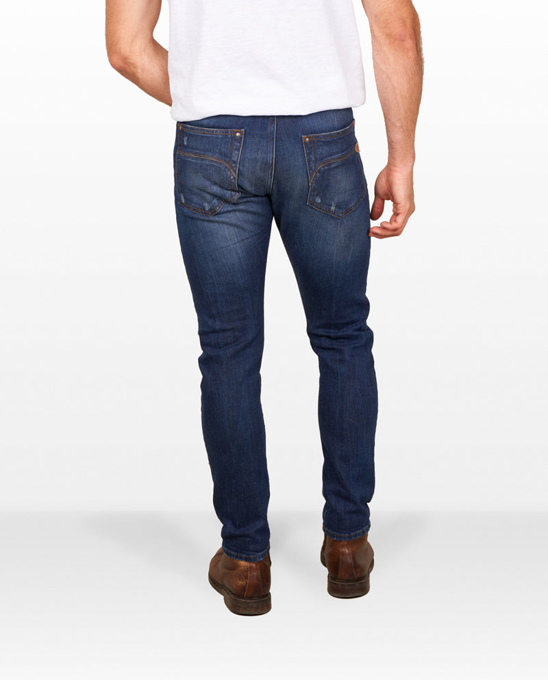 Men's jeans with tappered cut and worn effect